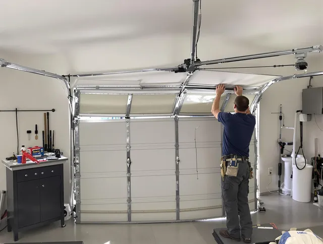 Kissimmee Garage Door Repair specialist performing precise section replacement on Kissimmee garage door
