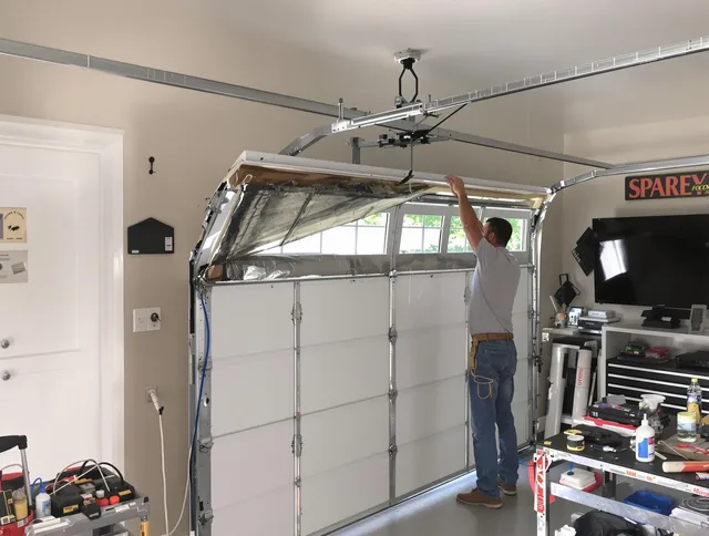 Garage door section replacement by Kissimmee Garage Door Repair in Kissimmee