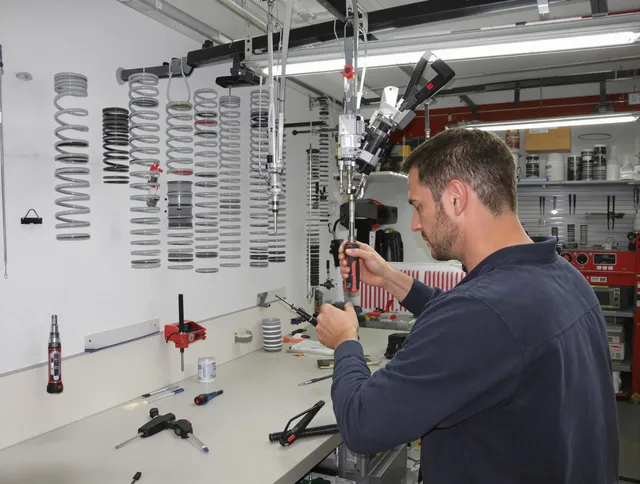 Kissimmee Garage Door Repair safety certified technician performing precision spring replacement in Kissimmee
